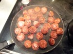 Saucisses de Toulouse en cuisson