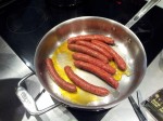Merguez en cuisson
